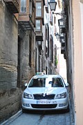 https://images.fineartamerica.com/images-small/narrow-street-in-toledo-spain-nimmi-solomon.jpg