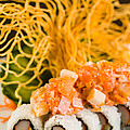 Crab and Salmon Roll Photograph by Raul Rodriguez Crab and Salmon Roll Photograph by Raul Rodriguez