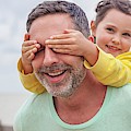 Daughter Covering Father's Eyes #1 Photograph by Science Photo Library