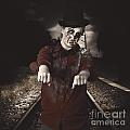 Zombie walking undead down train tracks by Jorgo Photography