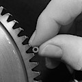 1970s Hands Holding Tiny Gear Alongside by Vintage Images 1970s Hands Holding Tiny Gear Alongside by Vintage Images