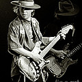 Stevie Ray Vaughan 1984 Photograph by Chuck Spang Stevie Ray Vaughan 1984 Photograph by Chuck Spang