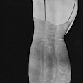 A Negative Print Of A Woman Wearing A Corset