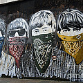 The Beatles wearing face masks street mural by RicardMN Photography The Beatles wearing face masks street mural by RicardMN Photography