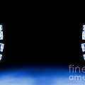 Blue LED lights both sides of the image with space for text Photograph by Simon Bratt Blue LED lights both sides of the image with space for text Photograph by Simon Bratt