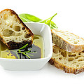 Bread olive oil and vinegar by Elena Elisseeva