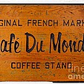 Cafe Du Monde Sign in New Orleans Louisiana by Paul Velgos Cafe Du Monde Sign in New Orleans Louisiana by Paul Velgos