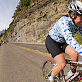 Cyclists Climb A Hill With A Mountain by Heath Korvola Cyclists Climb A Hill With A Mountain by Heath Korvola