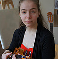 Girl in red and black with a violin Photograph by Elena Perelman Girl in red and black with a violin Photograph by Elena Perelman