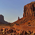 The Dusty Trail - Monument Valley Photograph by Mike McGlothlen