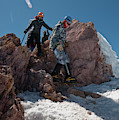 Three People Climb Down Rocks by Beth Wald Three People Climb Down Rocks by Beth Wald