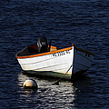 White Wooden Dinghy at Pamet Harbor on Cape Cod Photograph by Juergen Roth White Wooden Dinghy at Pamet Harbor on Cape Cod Photograph by Juergen Roth