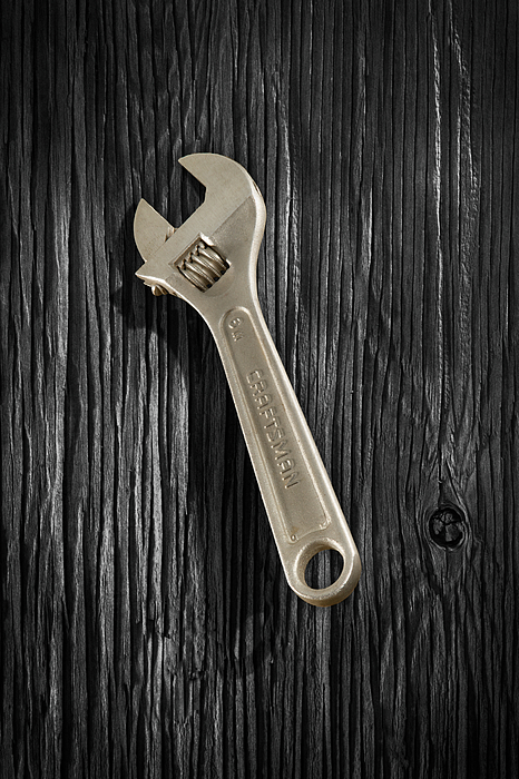 Adjustable Wrench Over Black And White Wood 72 Photograph