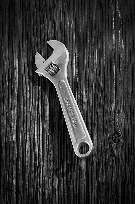 Adjustable Wrench Over Wood 72 In Black And White Photograph