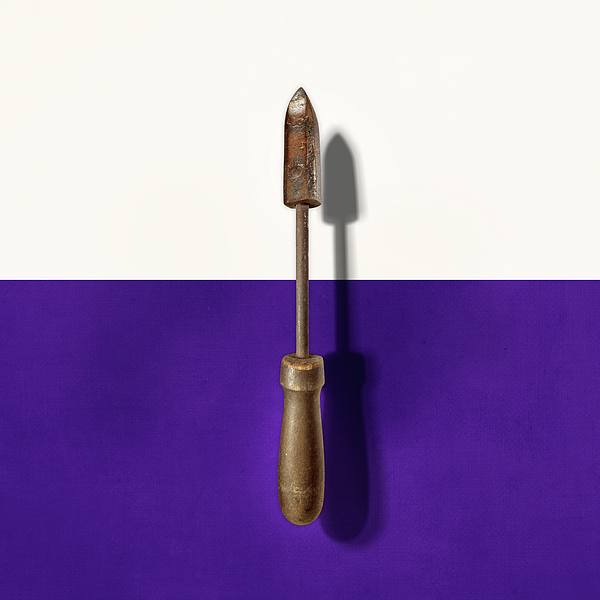 Antique Soldering Iron On Color Paper Photograph