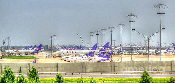 FedEx plane landing at the Memphis International Airport Jigsaw Puzzle by  Billy Morris - Pixels