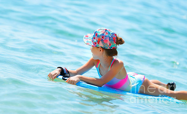 https://images.fineartamerica.com/images/artworkimages/medium/1/happy-little-girl-swimming-on-the-bodyboard-anna-om.jpg