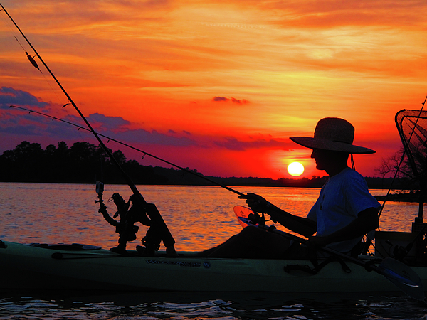 Kayak fishing at Sunset T-Shirt by Robbie Johnson - Pixels