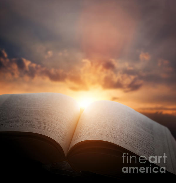 Open old book with light from sunset sky Throw Pillow by Michal Bednarek -  Pixels