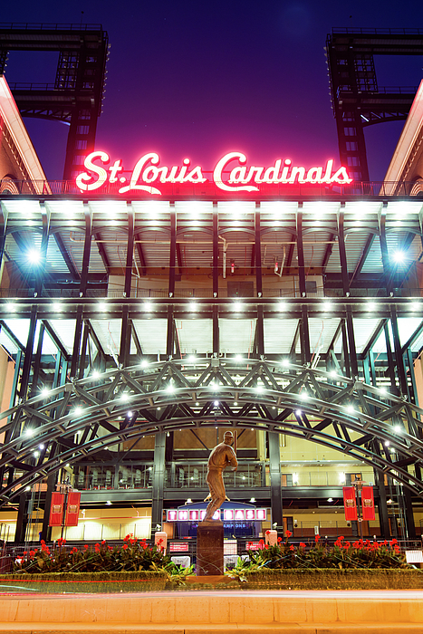 St. Louis Cardinals neon sign with downtown from Busch Stadium