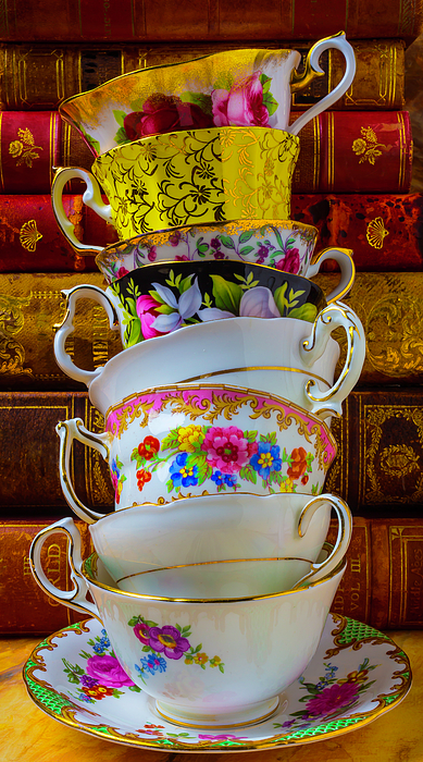 https://images.fineartamerica.com/images/artworkimages/medium/1/tea-cups-stacked-against-old-books-garry-gay.jpg