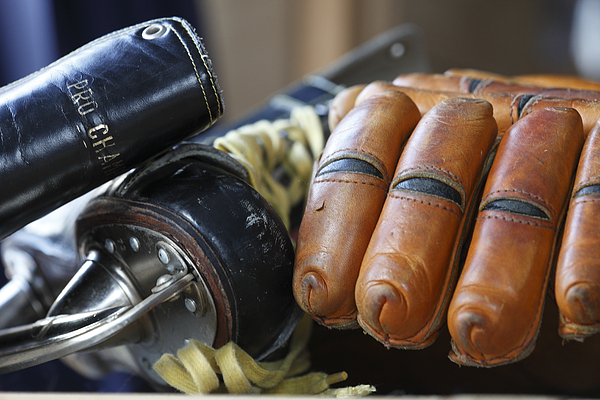 Vintage ice hockey gloves and puck Photograph by Ulrich Kunst And Bettina  Scheidulin - Fine Art America