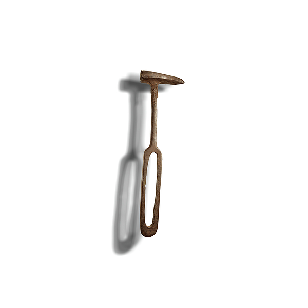 Vintage Rustic Hammer Floating On White Photograph