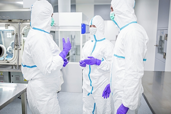 Science Photo Library - Lab Technicians In Sterile Environment