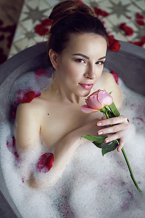 Beautiful Girl Lying In A Stone Bath With Rose Petals And Foam #9  Photograph by Elena Saulich - Pixels