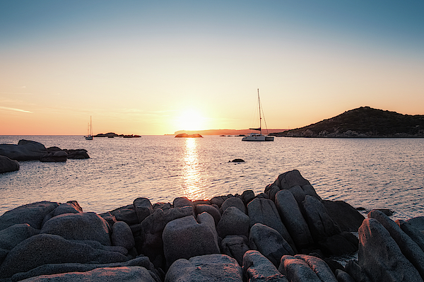 Sun setting over beach and calvi citadel in Corsica Tote Bag by Jon Ingall  - Pixels