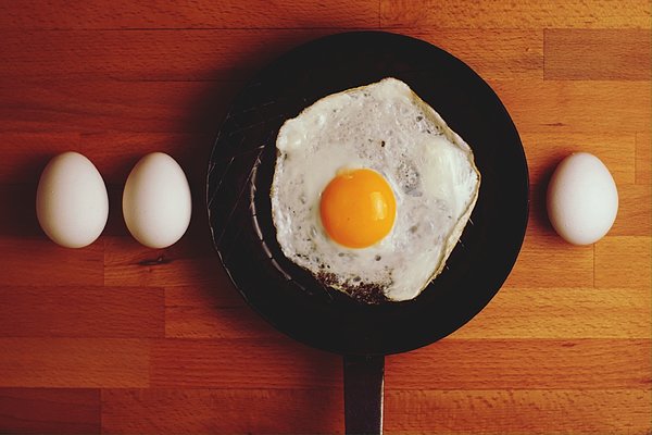 Pale Egg Against Blue Weekender Tote Bag