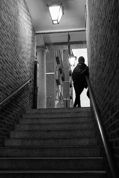 Loneliness and waiting. Girl on top of the stairs at the exit of a subway Hand  Towel by Marco Mariani - Pixels