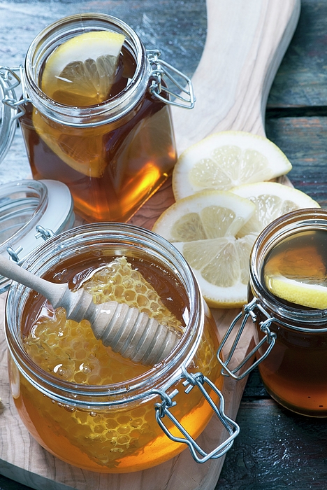 Organic Honey With Honey Comb In Mason Jar iPhone Case by Spyros