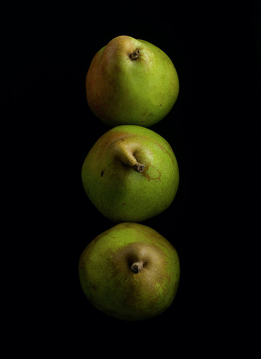 Three Anjou Pears On A Black Surface Tote Bag by Howard Bjornson - Fine Art  America