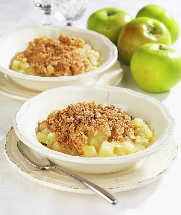 https://images.fineartamerica.com/images/artworkimages/medium/2/two-bowls-of-apple-crumble-with-fresh-apples-next-to-them-robert-morris.jpg