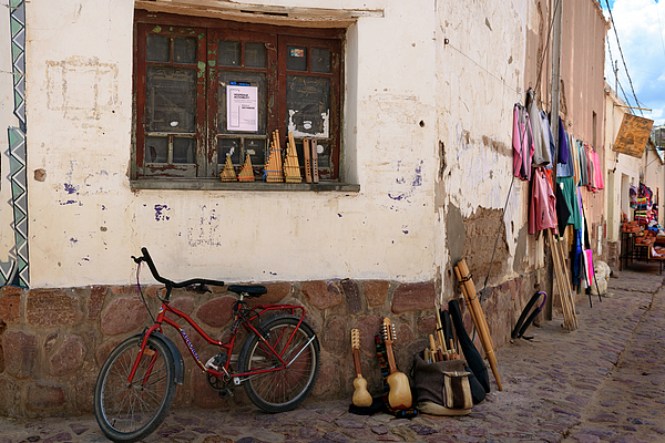 RicardMN Photography - Bicycle and traditional instruments in Humahuaca