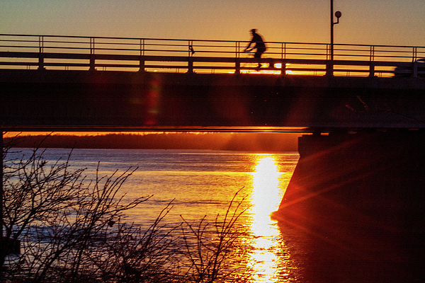 Tatiana Travelways - Bike rider at sunset