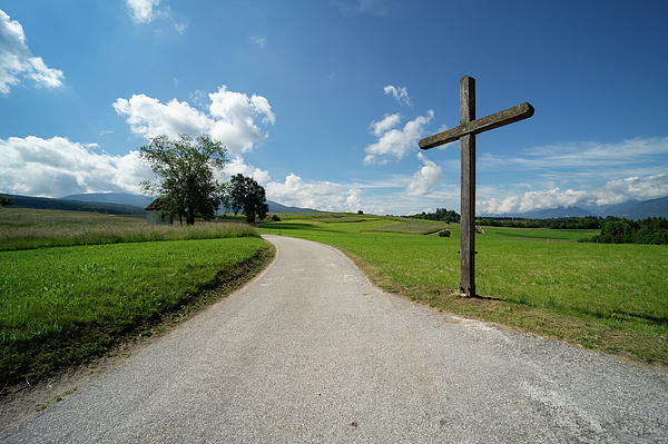 Christian cross in the countryside along the Way of St. James pilgrimage  path in South Tyrol Beach Towel by Riccardo Bianchini - Fine Art America