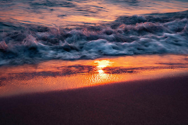Sven Brogren - Cool frothy waves mix cool blues with sun rise orange