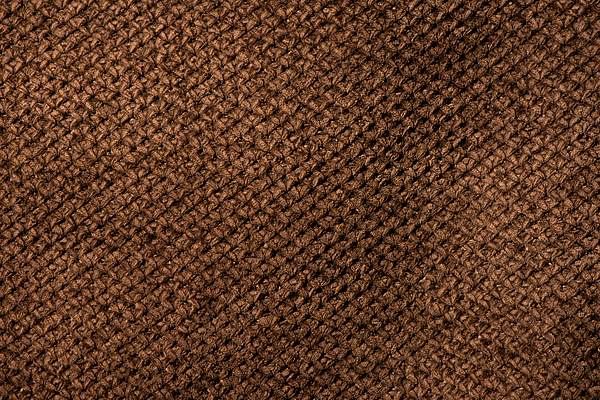 Crumpled dark brown fabric texture, wavy wrinkled cloth pattern