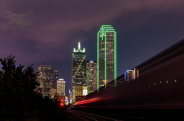 Beautiful Dallas TX skyline at night. by David Ilzhoefer