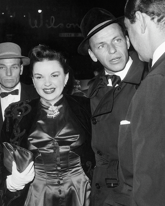 Frank Sinatra and Judy Garland candid at movie premiere 1955. Greeting Card