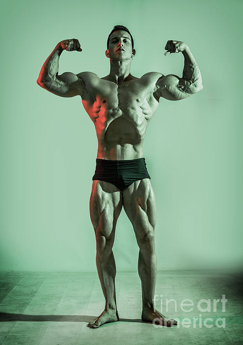 Handsome black male bodybuilder posing in gym Stock Photo by ©artofphoto  68772911