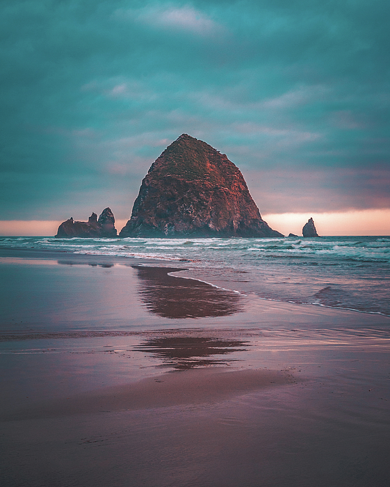 Canvas print of Haystack Rock newest (sea stack) in Cannon Beach, Oregon.