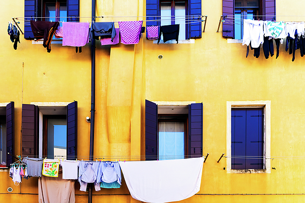 Washing Drying Outside Coloured Houses On The Island Of