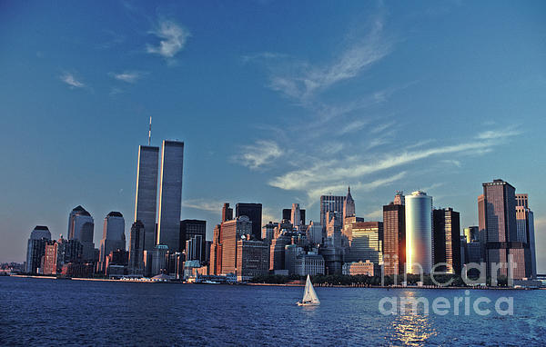 Early Winter, 1998, The Hudson River, New York City. Sunlight is seen  reflecting off of The World by Tom Wurl