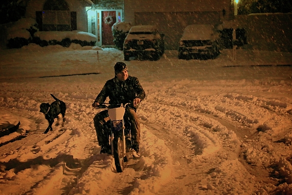 Dennis Baswell - Motorbiking with dog in snow at night 