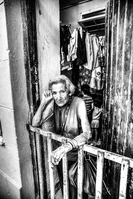 Paul Thompson - Old Cuban Woman In Doorway Portrait Of Cuban Life
