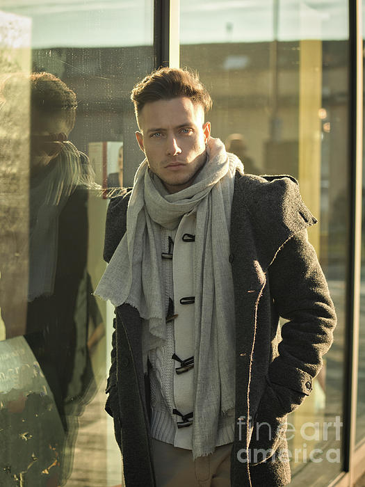 https://images.fineartamerica.com/images/artworkimages/medium/3/one-handsome-young-man-in-city-setting-in-winter-or-autumn-outfit-stefano-c.jpg