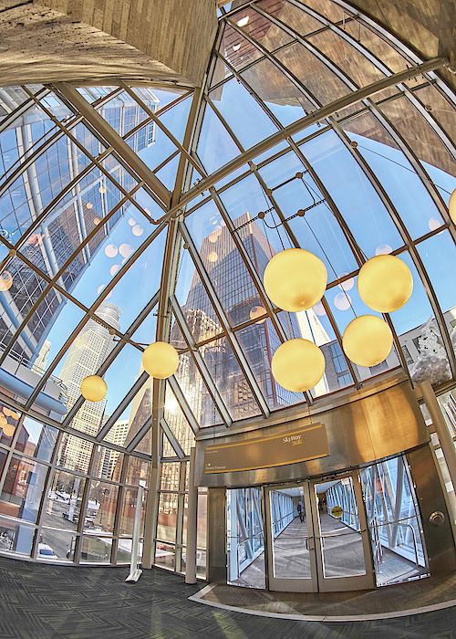 Jim Hughes - Taking in the light in a Minneapolis skyway